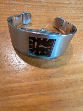 Nixon Silver The Cleo Cuff Watch with Black Dial